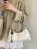 Bolsa Tote Feminina Popular Estilo Coreano para o Dia a Dia com Rebites Nova Textura Leve Luxo 2026 Vintage Chique de Ombro