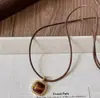 Colar pingente vintage de gota d'água, cacho de uvas e peixinho para mulheres, corrente de suéter de nicho de luxo leve, acessório para pescoço longo