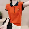 Verão 2026 Novo Estilo Rosto Sorridente Bordado de Girassol Malha Fina de Manga Curta com Gola Camiseta Top para Mulheres