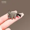 Nuevo Broche Pin Sencillo de Zirconia Negra tipo Pistola con Dibujo de Mapache Accesorios de Moda de Corea del Sur Pinza de Pato para Mujer