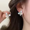 Pendientes de Lazos Microincrustados de Circonita de Venta Caliente Estilo Coreano 2026 para Mujer, Aguja de Plata S925, Pendientes de Perla de Botón de Gama Alta Nicho