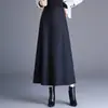 Falda de lana de corte A con estampado de leopardo de moda para mujer, nuevo estilo otoño e invierno 2026, de cintura alta, que cubre la cadera, con dobladillo amplio, moderna y rejuvenecedora