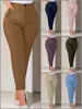 Calça feminina skinny tipo lápis outono novo, europeia e americana, plus size, para uso transfronteiriço, disponível em várias cores, adequada para o trabalho e uso profissional.