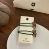 Pinza para el pelo de esmalte con lazo dulce y elegante 2026 modelo nuevo clip para patillas laterales accesorio para el cabello verano