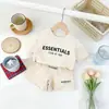 2026 Estilo Novo Europeu e Americano Roupas Infantis Camiseta com Letra Marca Tendência Meninos e Meninas Conjunto Esportivo de Verão Manga Curta Transfronteiriço para Bebê