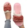 Diretamente do Fabricante, Dropshipping de Venda Quente Transfronteiriça, Pantufas para Casa de Quatro Estações com Laço, Pantufas Peludas Masculinas e Femininas no Atacado