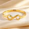 Pulsera de Serpiente Lisa Retorcida Color Dorado, No se Desvanece, Estilo de Moda Europeo y Americano, Cierre Versátil de Apertura, Pulsera de Acero de Titanio para Mujer