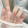 Piezas de Uñas Prefabricadas de Armadura Pura Explosiva Usadas a Mano Parche de Uñas Gradiente de Sentido Avanzado Piezas de Uñas Falsas Little Red Book