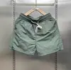 Pantalones Cortos Finos de Seda Helada de Verano Personalizados de Secado Rápido 2026 Marca de Moda Casual Pantalones Tres Cuartos Cordón Pareja Color Sólido Pantalones Cortos de Playa
