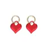 Corea del Sur Dongdaemun elegante celebridad de internet nicho diseño todo-partido hebilla de oreja femenina estilo coreano nuevo Pendientes de amor rojo femenino