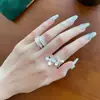 Anillo Asimétrico de Flores Pequeñas, Femenino, Elegante, Versátil, Anillo Abierto Apilable, Anillo Único Estilo Ins para Dedo Índice, Transfronterizo