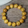 Venda por atacado direto do fabricante: Pulseiras Nan de Seda Dourada para Homens e Mulheres, Contas de Oração Budistas, Contas de Madeira Zhennan Folha Pequena, Contas de Oração, Disponível para Dropshipping