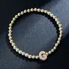 Pulsera elástica para mujer Amazon Transfronteriza Moda Letra Simple Cobre Incrustado con Circonita y Cuentas Uvccb