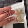 Novos Brincos de Tarraxa Estrela de Quatro Pontas com Strass Completo Zircônia para Mulheres Design de Nicho Versátil de Alta Qualidade Exquisite Brinco de Lua Crescente para Mulheres