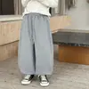 TongKu 2026 Inverno Novo Calça de Moletom Estilo Coreano para Meninos Calça Macacão de Lã com Punho nos Pés para Bebês Calça Longa Infantil Tendência