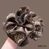 Faixa de Cabelo Estampada de Leopardo Retrô para Mulheres 2025 Nova Faixa de Cabelo de Cabeça Alta com Bola Corda de Cabelo para Rabo de Cavalo Alto Amarrar Cabelo Flor de Cabeça