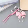 Pingente de Bolsa Novo com Laço de Pérola Estilo Chanel Acessórios Pendurados para Bolsa Miu Cordão Tecido à Mão