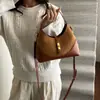 Bolso de mujer de alta gama, diseño de bloques de color, de nicho, modelo nuevo 2025, bolso de mano versátil para el día a día, bolso de moda tipo dumpling