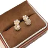 Novedoso Estilo Aretes Apilados con Diamantes Acabado Perla de Luz de Luna de Cristal Aretes de Flor de Perla Apilados con Diamantes Súper Brillantes