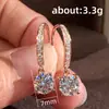 Pendientes de Diamante Blanco Redondo con Cuatro Garras de Circonia Completa Transfronterizos Pendientes para Mujer Pendientes de Gancho Coreanos Dongdaemun Joyería