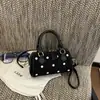 Bolso de Mano con Forma de Almohada de Moda para Mujer 2026 Nuevo Estilo Bolso de Mano Tipo Bola de Bolos Textura de Moda Bolso de Hombro Único Cruzado