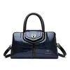 Bolsas Femininas Novo Estilo 2026 Moda Couro Patente Bolsa de Ombro Feminina Bolsa de Mão Retrô Europeia e Americana Feminina Atacado