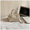 Bolso tipo almohada de moda 2026 Nuevo modelo de primavera, Bolso cruzado de un solo hombro único y elegante, Bolso popular casual texturizado para el hombro