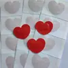 Producción al por mayor transfronteriza de fábrica de Vendas con forma especial de corazón rojo, Vendas lindas con forma de corazón de dibujos animados