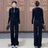 Traje deportivo casual de moda para mujer, nuevo estilo primavera 2026, elegante y adelgazante, conjunto de dos piezas con cárdigan de cuello alto y pantalones de pierna ancha