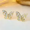 Pendientes de mariposa con microincrustaciones de circonita de lujo ligero, pequeños y exquisitos, estilo de pendientes delicado, lujo ligero con un toque de alta gama, versátiles para el uso diario