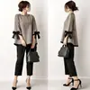 Conjunto de Dos Piezas: Top Holgado Estilo Japonés con Puño Ancho y Lazo + Pantalones Siete分 con Bolsillo de Parche