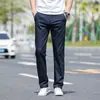 Pantalones Casuales para Hombre 2026 Nuevo Estilo Cuatro Estaciones Negocios Rectos Sueltos Color Sólido Pantalones Largos Otoño Pantalones Deportivos para Hombre