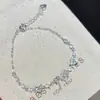 Suave en la muñeca~Pulsera de corazón con lazo de luz de estrellas brillante para mujer, nuevo modelo 2026, joyería de corazón azul de diamante para niñas