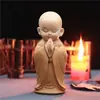 Pequeno sofá reclinável Maitreya ornamentos de lazer armário de TV doméstico decorações interessantes chinesas artesanato de resina fabricantes atacado