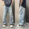 Jeans de mezclilla rotos y salpicados para hombre, corte recto, ajuste holgado, estilo American high street, marca de moda, pantalones largos con diseño de graffiti retro y cool