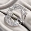 Anillo de acero de titanio chapado en oro de moda europea y americana, diseño de nicho de alta gama para mujer, anillo ajustable de acero inoxidable hueco con apertura