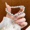 Nova Pulseira de Miçangas Redondas com Pingente de Franja para Mulheres, Joia com Design Elegante, Luxo Leve, de Alta Qualidade, Fashion e Versátil