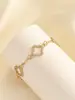 Pulsera Nueva Simple de Trébol de Cuatro Hojas de la Suerte 2025 para Mujer Estilo Francés Dulce Alto Nivel Zirconia Hueca Flor de Cuatro Hojas