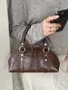 Bolsa feminina Shuai Mi Jia de cor sólida simples, nova bolsa feminina da moda, bolsa de ombro e transversal estilosa e única de nicho