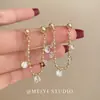 Pendientes de borla de circonita con cadena delantera y trasera estilo retro francés, diseño de nicho de alta gama, pendientes elegantes, accesorios de moda al por mayor