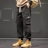 Macacão novo 2024 masculino primavera e outono tamanho grande perna larga calça casual adolescentes americanos calça multi-bolsos