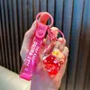 Llavero de concha con arena movediza rellena de aceite, colgante de concha pequeña de dibujos animados en acrílico, accesorio para bolso, pequeño regalo para niñas, al por mayor