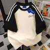 Camiseta Casual Color-Blocking com Estampa de Letras de Manga Curta Estilo Simples para o Dia a Dia 2026 Verão Novo Top Versátil Soltinho