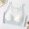 Sujetadores deportivos sin costuras en stock para el período de desarrollo de estudiantes de preparatoria, estudiantes de secundaria, adolescentes y niñas mayores con tops tipo tank top.