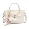 Bolsa Doce com Laço para Mulheres 2026 Nova Primavera Versátil Retro Bolsa Transversal Estilo Coreano Popular Bolsa de Mão tipo Balde