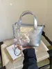 Bolso de mano para mujer con estampado de rombos 2026 nuevo de moda verano moda nicho para ir al trabajo al hombro bandolera cubo