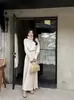 Elegante diseño estilo francés, blusa de manga larga retorcida, nuevo top de invierno ajustado para mujer