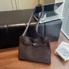 Bolsos de nicho coreanos, bolsos de mujer de gran capacidad, bolsos tote retro de alta gama, bolsos de hombro casuales a la moda y bolsos de axila