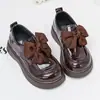 Zapatos de cuero para niña 2026, moño brillante, suela gruesa, suela blanda, versátiles, antideslizantes, estilo princesa, nuevos zapatos de moda de primavera y otoño
