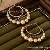 Pendientes de aro de cuentas redondas exageradas estilo ins europeo y americano para mujer personalidad temperamento pendientes de cuentas pendientes de moda joyería de Qingdao
